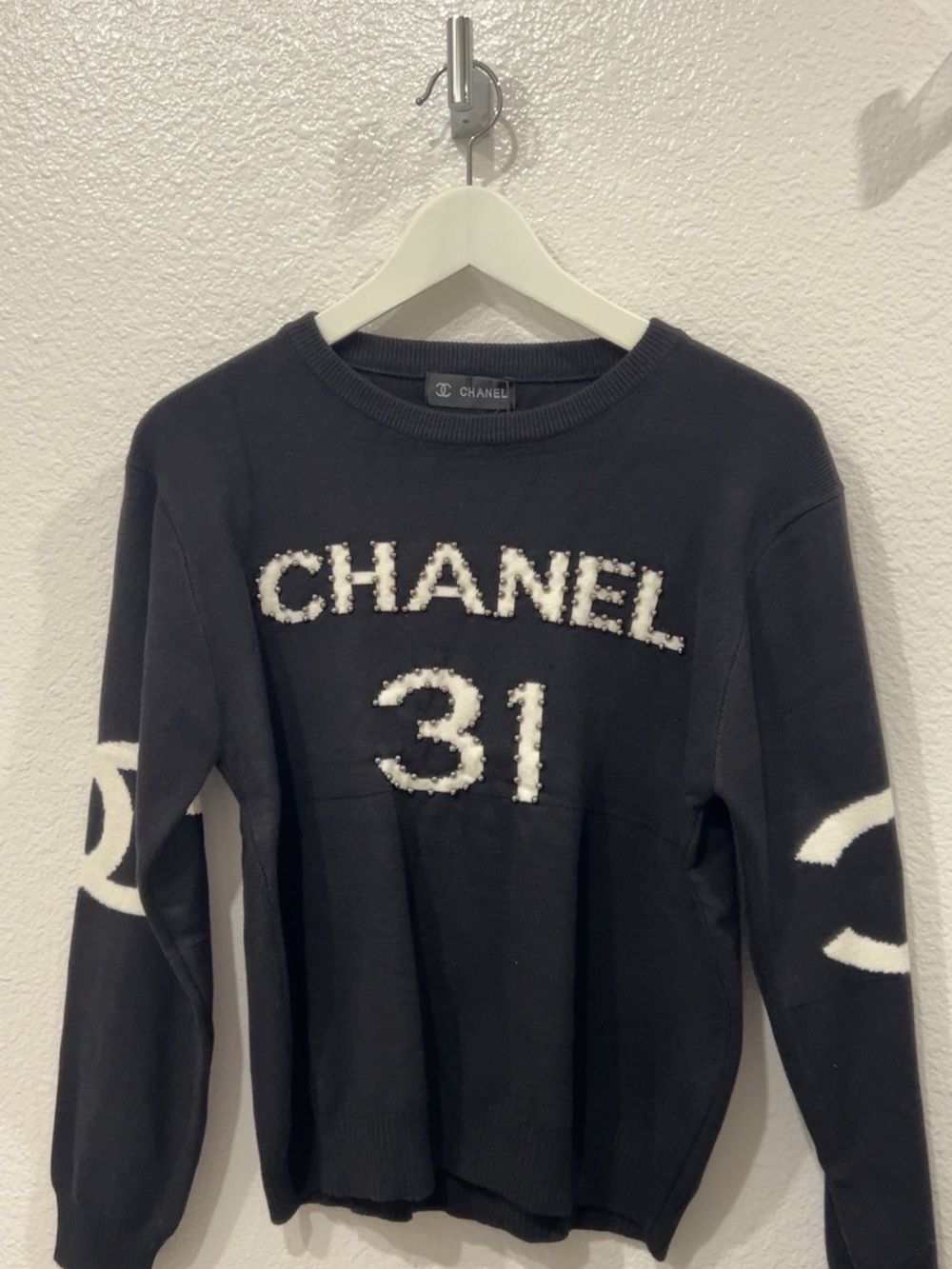CHANEL Black Crewneck Sweater with White Logo Accents
